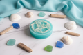 Ocean Breeze Loofah Soap - teal round soap bar with natural loofah fibers and coastal styling
