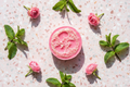 Minty Rose Loofah Soap - pink round soap bar with natural loofah fibers on pink terrazzo surface